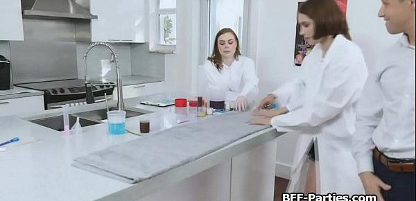  Three girlfriends sharing cock in lab coat